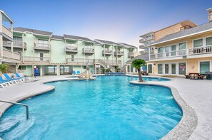 Admire the shimmering El Constante pool, perfect for refreshing dips after a long day of fun in the sun