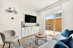 Living room opens to patio.