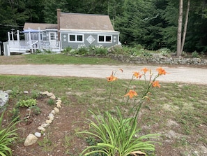 View of cottage from lake side of the road. 