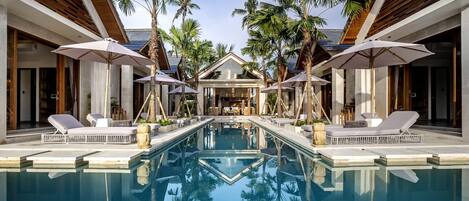 View of the villa and outside space from the pool