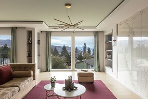 Living room with lake and mountain view