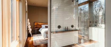 King bedroom, ensuite bath with double shower and soaking tub