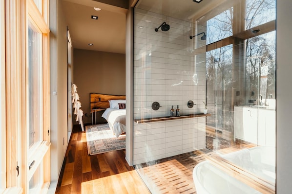 King bedroom, ensuite bath with double shower and soaking tub