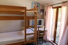 La chambre avec deux lits