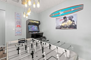 Awesome game room with arcade/multi-cade game & foosball table!