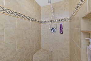 Modernized newly tiled walk in showers.