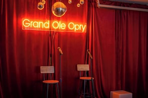 Party-ready garage w/ a karaoke, stage & two microphones for your own concert!