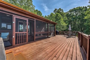 Sip coffee from the rocker while viewing the peaks from our screened-in porch 
