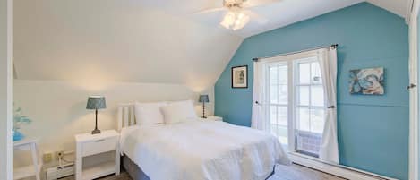 The Iceflower Bedroom has a queen bed, calm decor and beautiful soft sunlight.