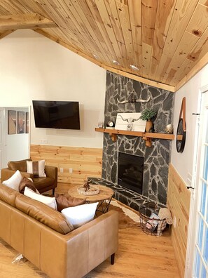 We have comfy seating for 4 in our modern, cozy living room.