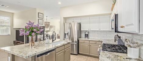 Kitchen with gas range and all new appliances 