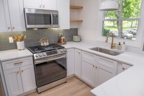 Kitchen 1- Newly renovated kitchen in main house with Samsung appliances