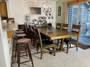 Dining Room with Coffee and Breakfast Bars.  Seating for 12 family and friends.