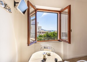 Table and window-Casa Bartolomea 8-Elba island