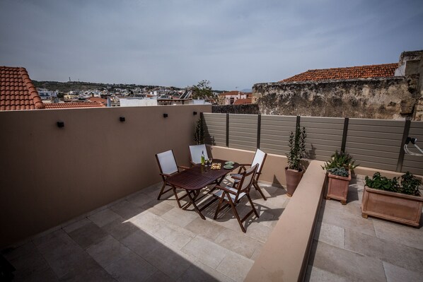 View of the outdoor terrace with the furniture and the plants to decorate it.