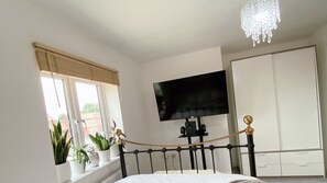 Bedroom with double bed;ensuite bathroom;wardrobe & large screen TV (Room 01)