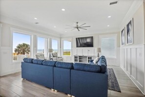 The ocean front living room is fabulous for movie night with the family.