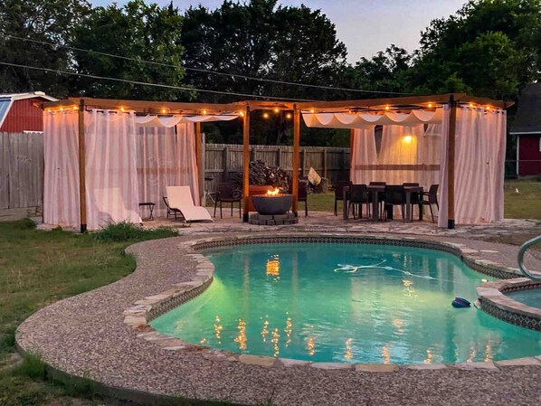 Amazing pool with pergolas, retractable roof and curtains