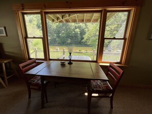 Breakfast table overlooking creek