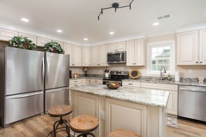 This Chef's Kitchen is outfitted to cooking equipment and ready for a family meal.
