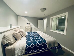The lake level king bedroom creates great space that is quite and set apart from the busy main floor living areas.