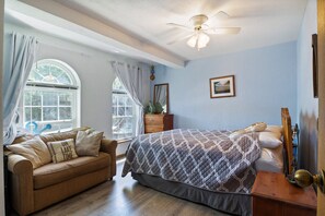 Queen Bedroom with beautiful views overlooking the lake with a twin pull out couch