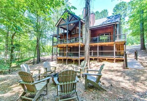 Welcome to your woodland sanctuary! This rustic cabin blends perfectly with its natural surroundings.