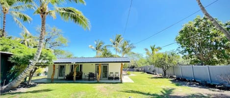 Well-kept beach house at end of Puako with large surrounding yard