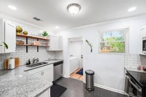 Newly added laundry room off the kitchen