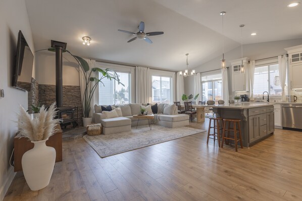 Open concept living room with 12' ceilings