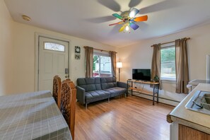 Open living space featuring a Roku streaming TV
