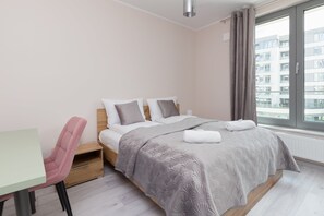 The bedroom's elegant decor creates a serene and restful environment.