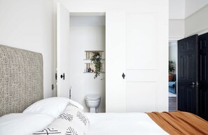 Flat 3 simple bedroom design flooded with with natural light.
