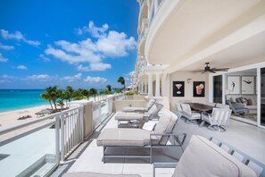 Relax on your private balcony with an oceanfront view.