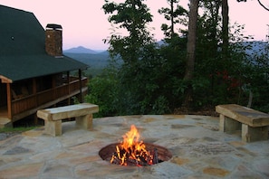 Huge fire pit at entry of Five Seasons