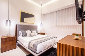 Stylish bedroom features a comfortable full-size bed