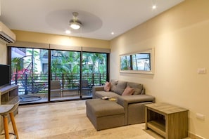 Comfy living space and direct access to the garden patio