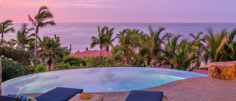 Views of the ocean and other surrounding homes from the pool of this Los Cabos Luxury Vacation Villa.