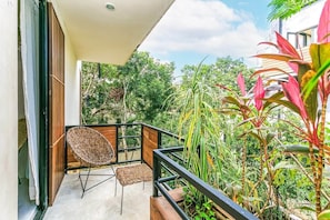 Enjoy jungle views from your private 3rd floor balcony