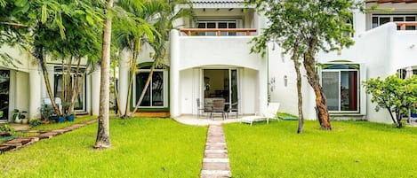 Lush landscape all around to view from your private back patio