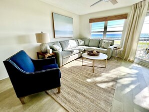 Living room with queen sleeper sofa. 