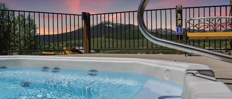 Relax in the hot tub with amazing views just steps from the condo