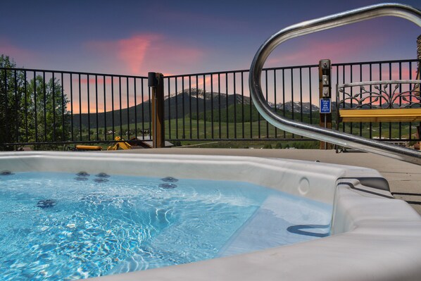 Relax in the hot tub with amazing views just steps from the condo