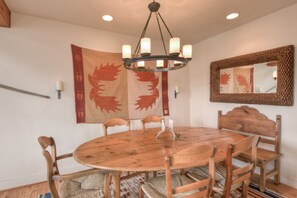 Play a game with friends at the large dining table | Main Level