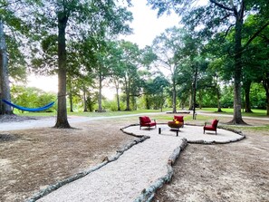 Relaxing around the firepit or in the hammock.