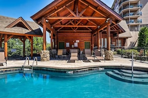 Cooling off in style from our resort's outdoor pool in the Smoky Mountains! ️