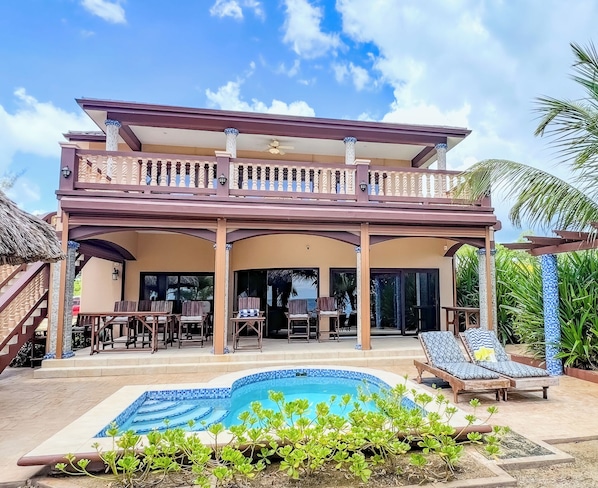 Beach front view of Villa By The Sea