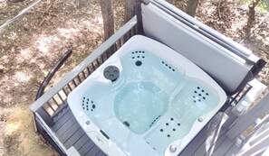 Our NEW hot tub is located on the lower deck and perfect for relaxing in nature!