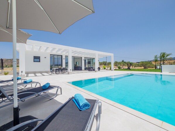 Outdoor area and pool of Villa Los Javieles Infinity Pool