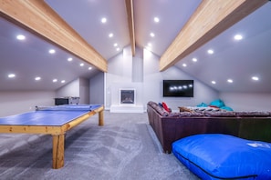 Let the games begin! Fireplace, Ping Pong, Foosball, 85" TV & Climbing Wall